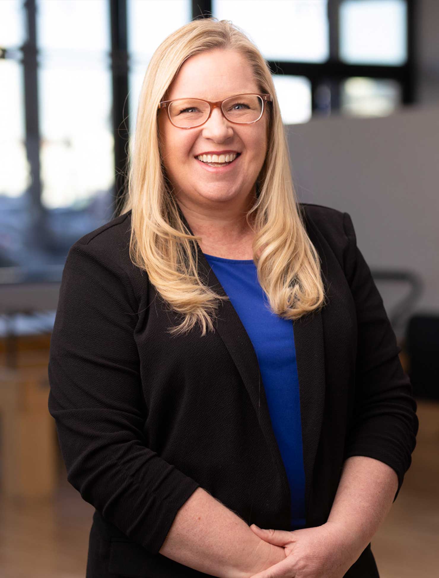 Headshot of Owner and Physical Therapist, Carrie Cameron.