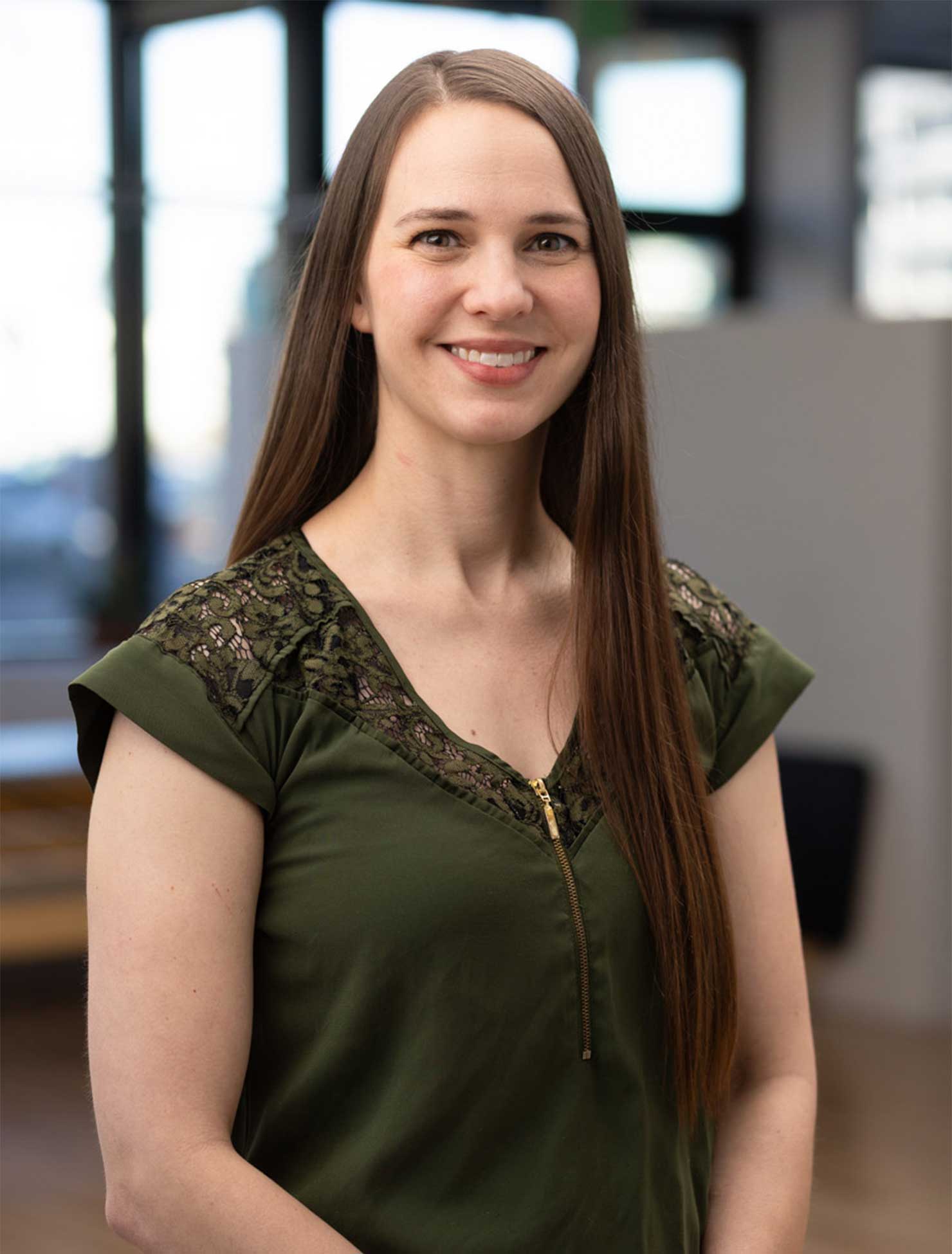 Headshot of Physical Therapist, Nicole Posnick-Wolf.